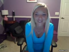 The sassy golden-haired woman reveals her big, full natural scoops after removing her T-shirt.